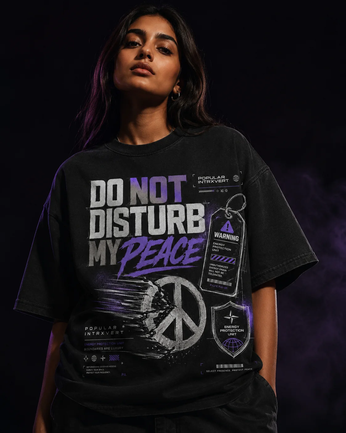 Model wearing the Popular Intrxvert Do Not Disturb My Peace tee