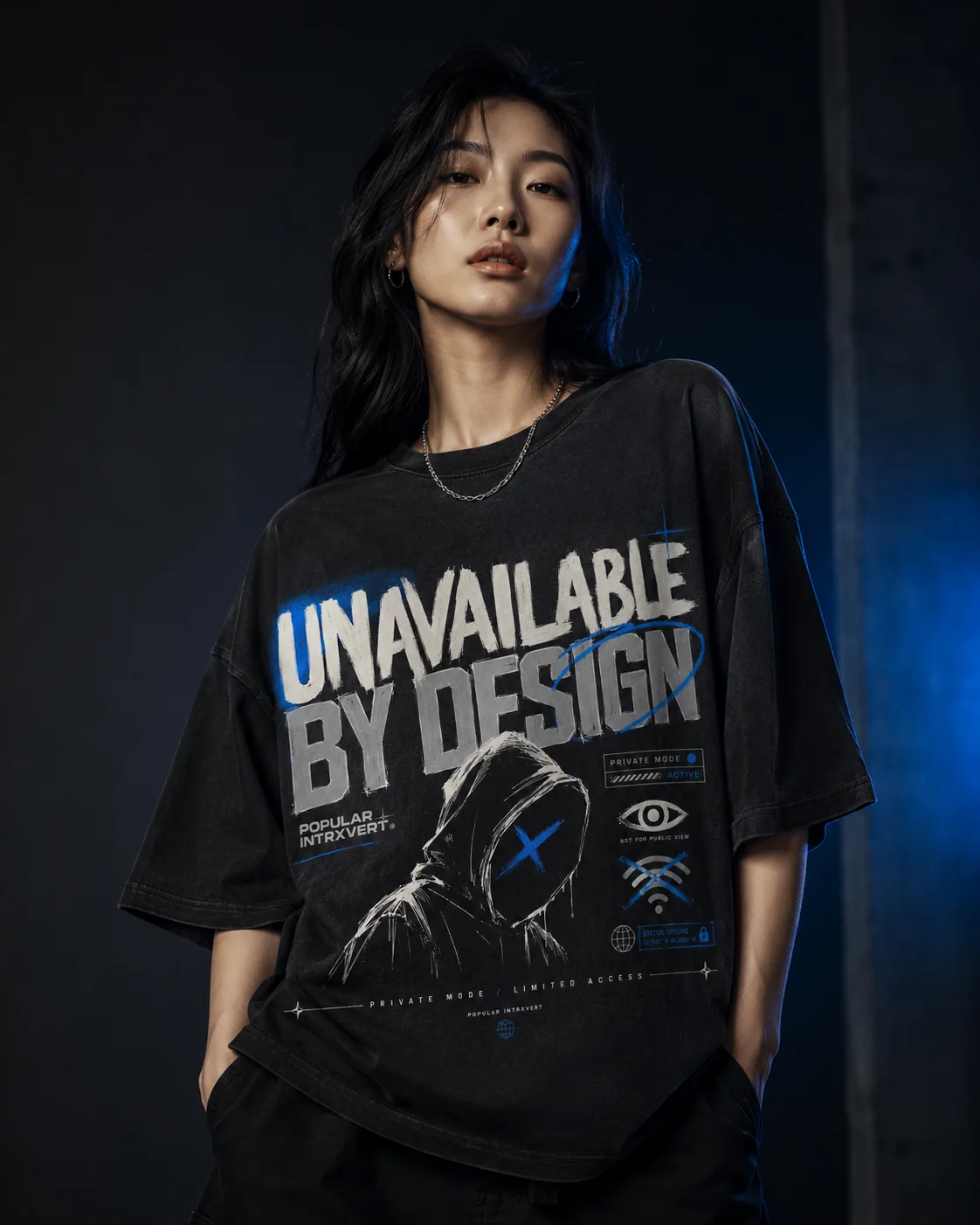 Model wearing the Popular Intrxvert Unavailable by Design tee